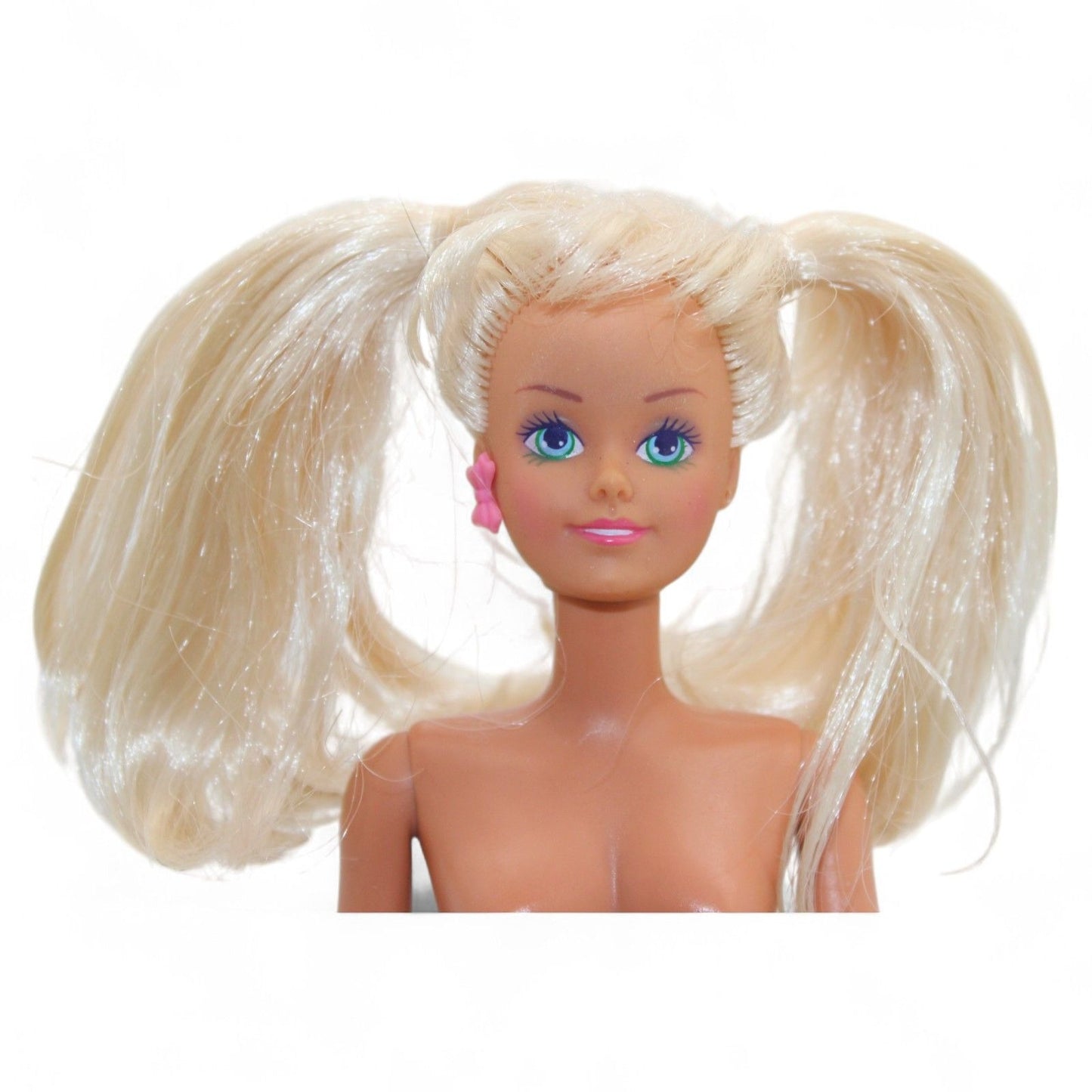 Vintage Mattel Ponytail Barbie #4 doll from 1960 with rooted blonde hair, hard plastic body, and iconic facial paint, in used condition.