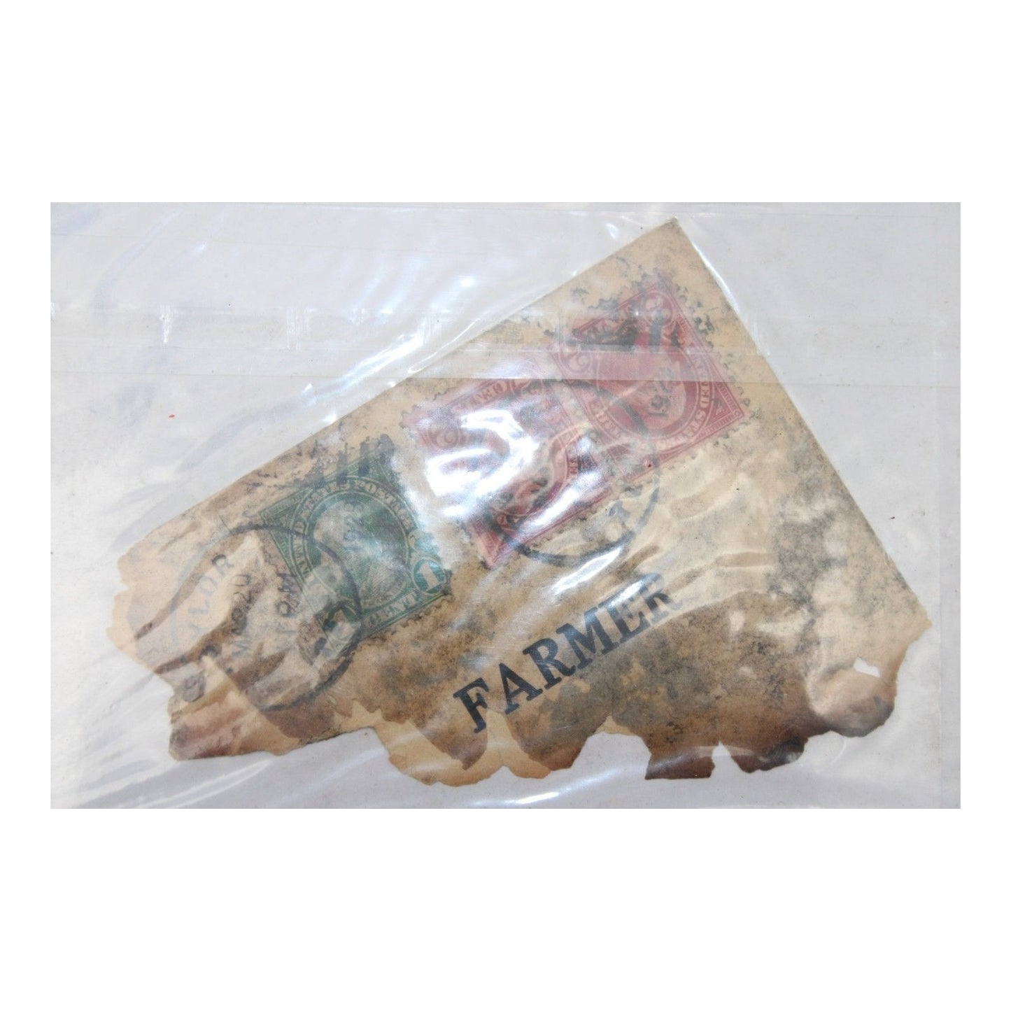Vintage-style paper with 'FARMER' printed on it, inside a clear plastic bag.