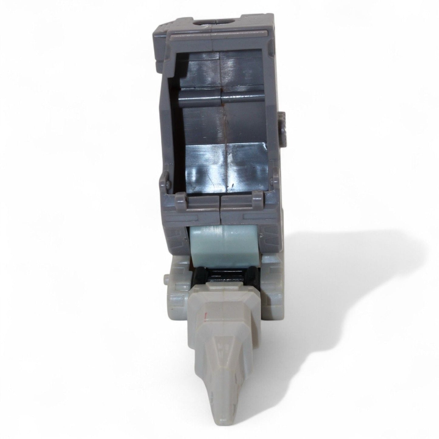 Side view of gray and purple Unicron replacement foot and leg