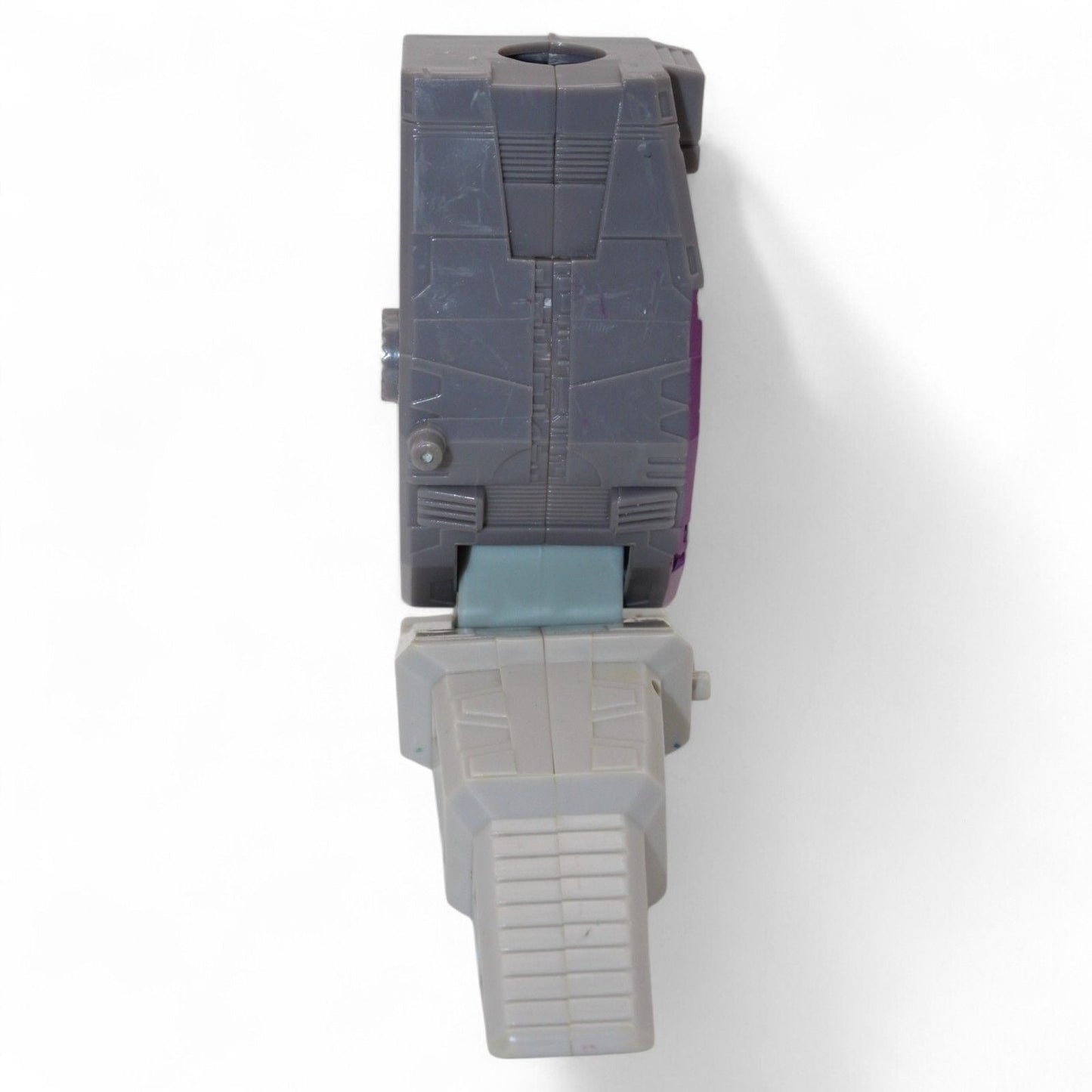 Top view of gray and purple Unicron foot and leg replacement