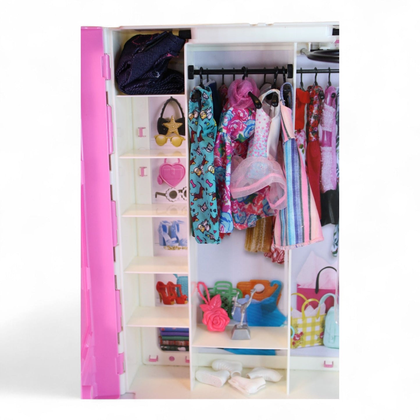 Close-up of Barbie Fashionista Closet Playset interior with clothes