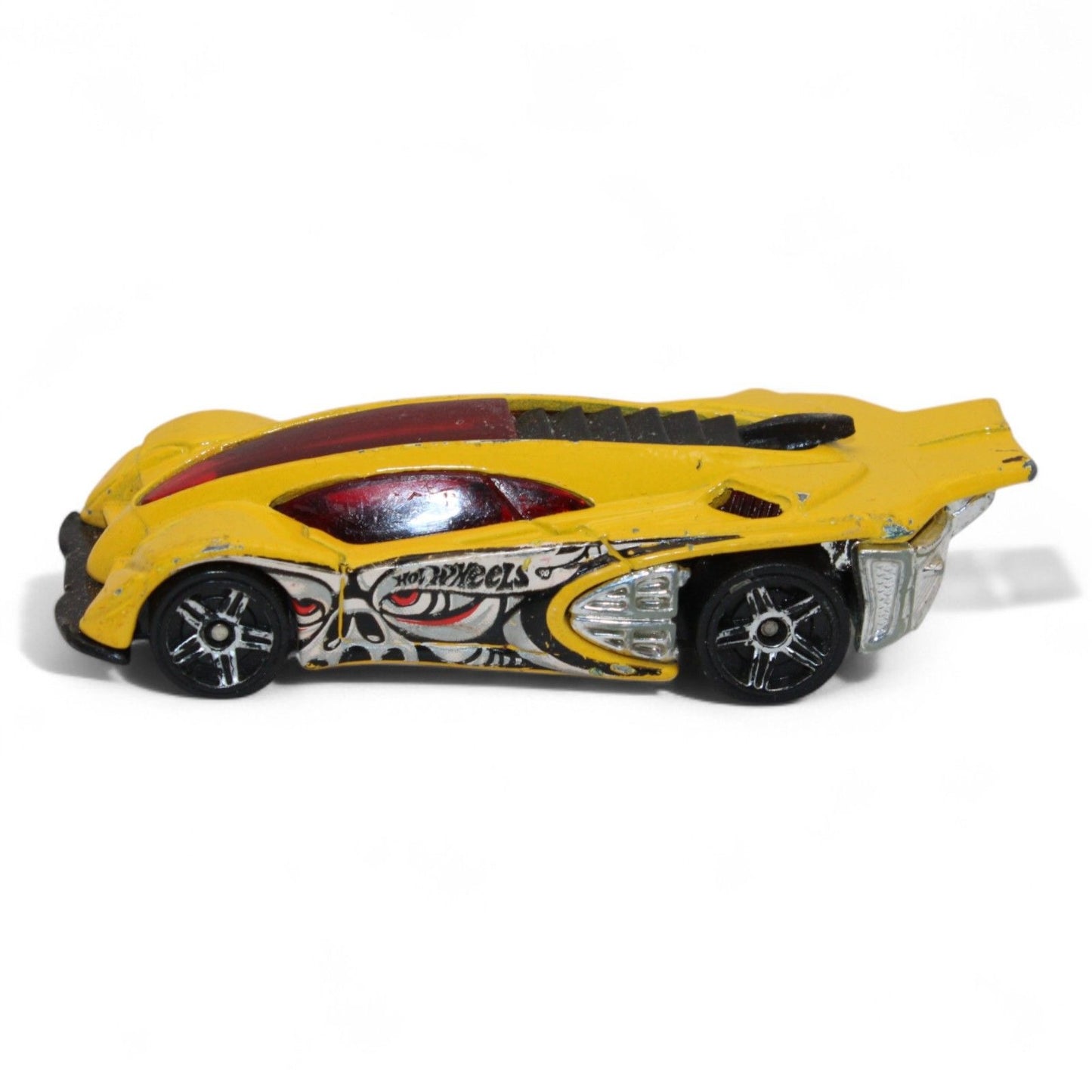 The 2004 Hot Wheels Yellow Side Draft Cyborg Assault is an ultra-rare die-cast toy car with sleek lines and exclusive graphic detailing.
