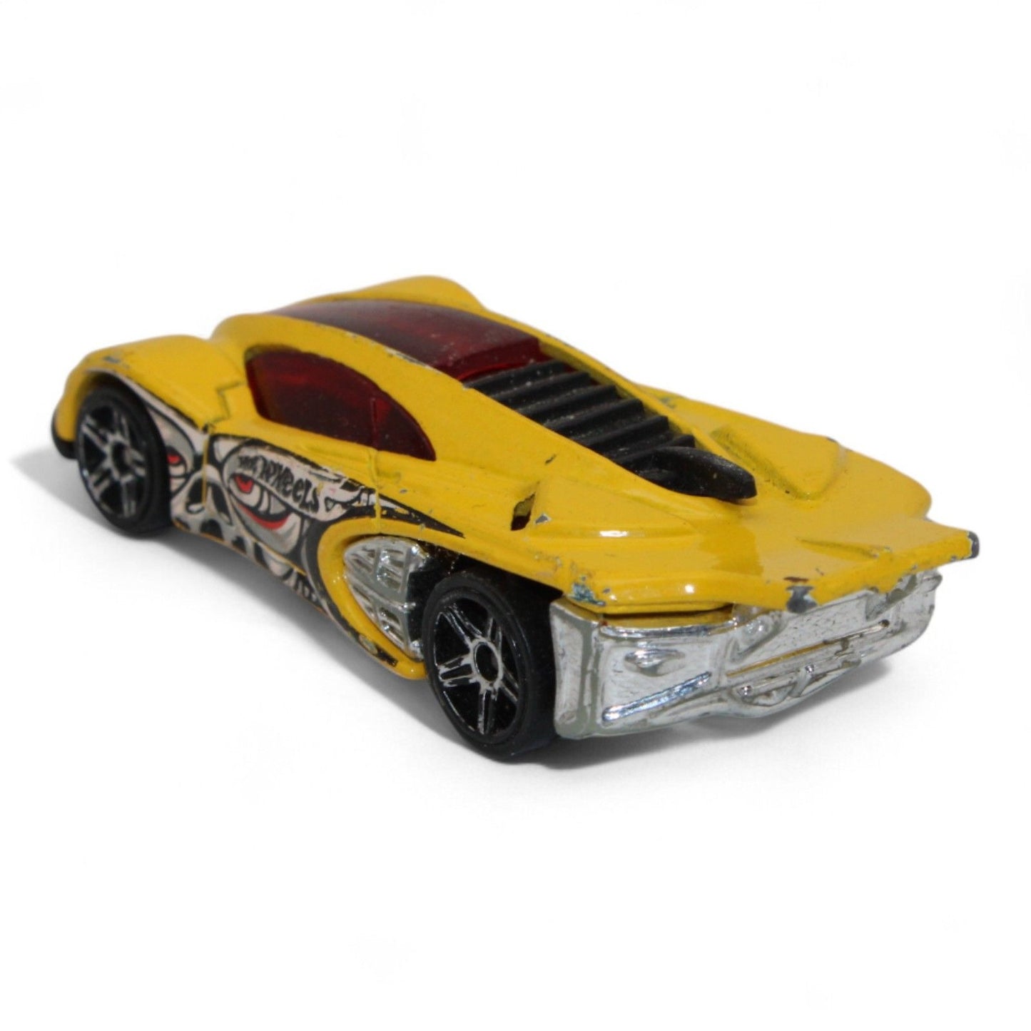 The 2004 Hot Wheels Yellow Side Draft Cyborg Assault is an ultra-rare die-cast toy car with sleek lines and exclusive graphic detailing.