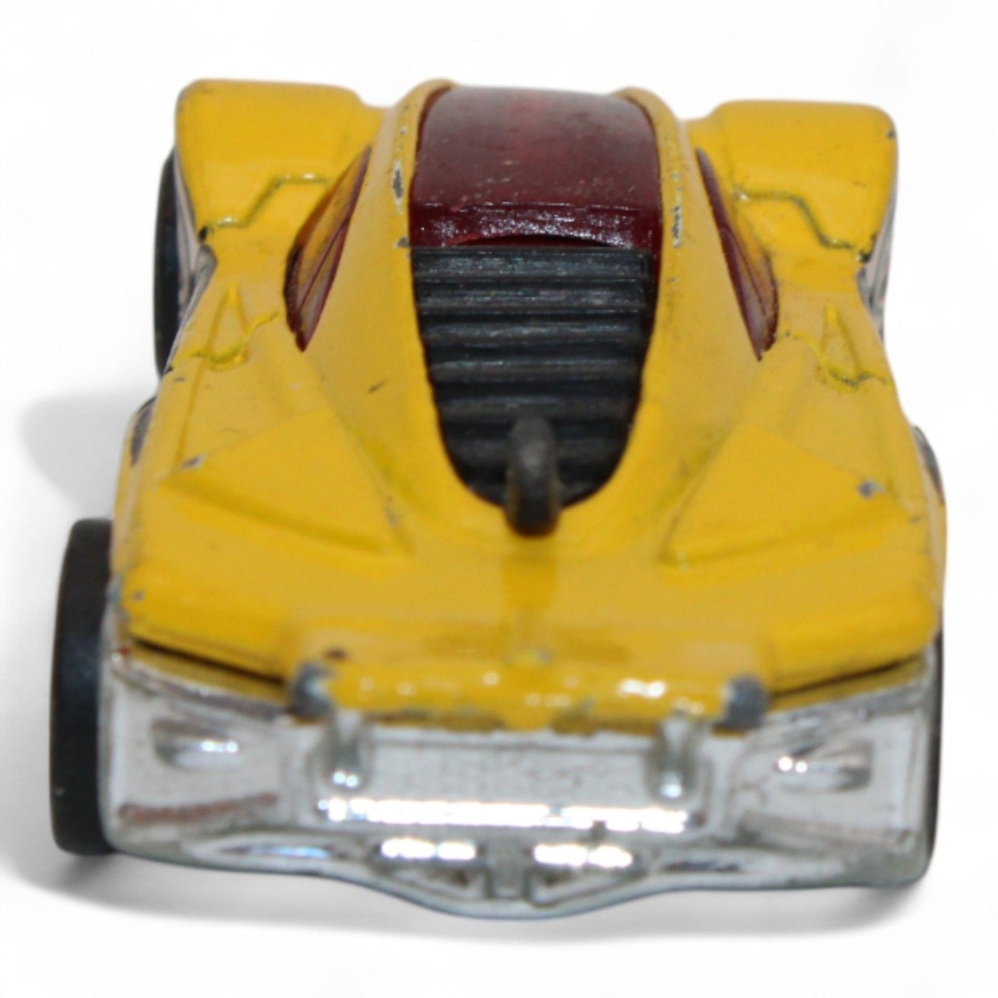 The 2004 Hot Wheels Yellow Side Draft Cyborg Assault is an ultra-rare die-cast toy car with sleek lines and exclusive graphic detailing.