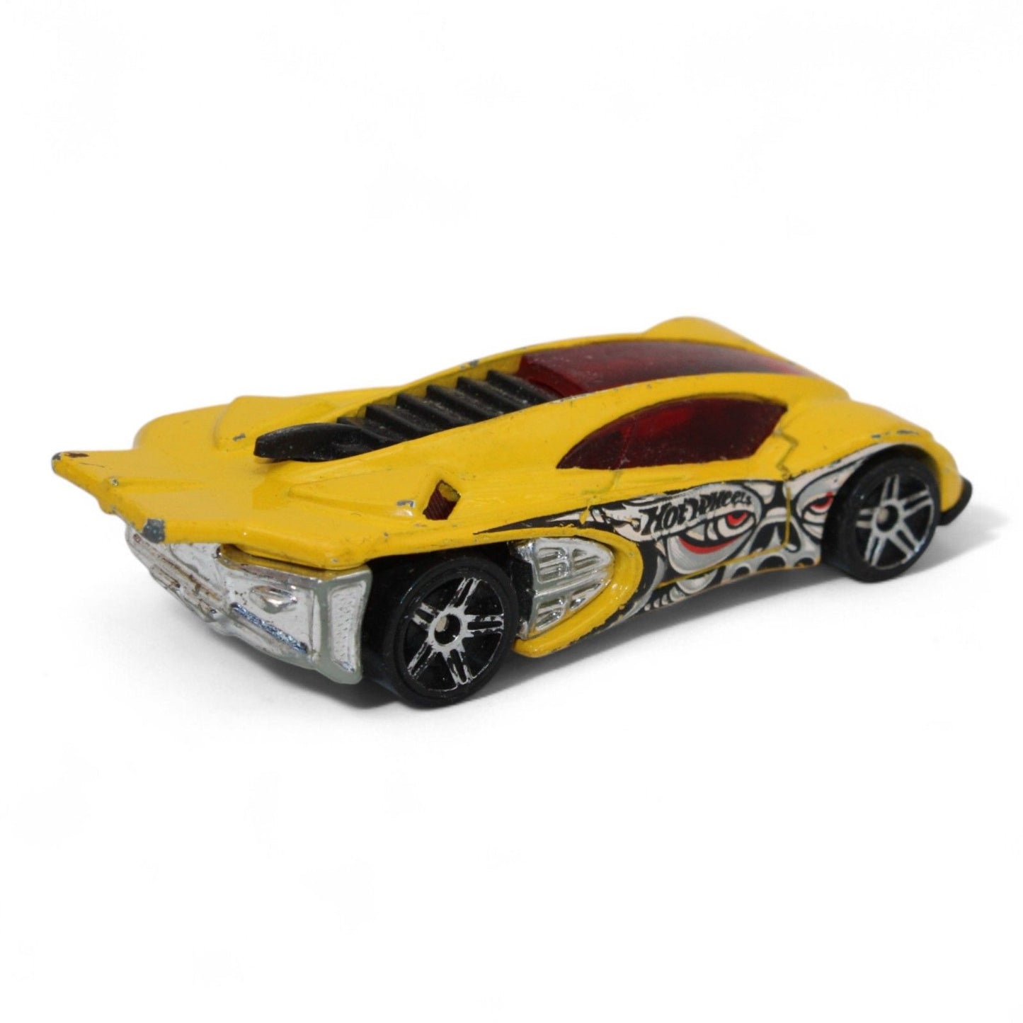 The 2004 Hot Wheels Yellow Side Draft Cyborg Assault is an ultra-rare die-cast toy car with sleek lines and exclusive graphic detailing.