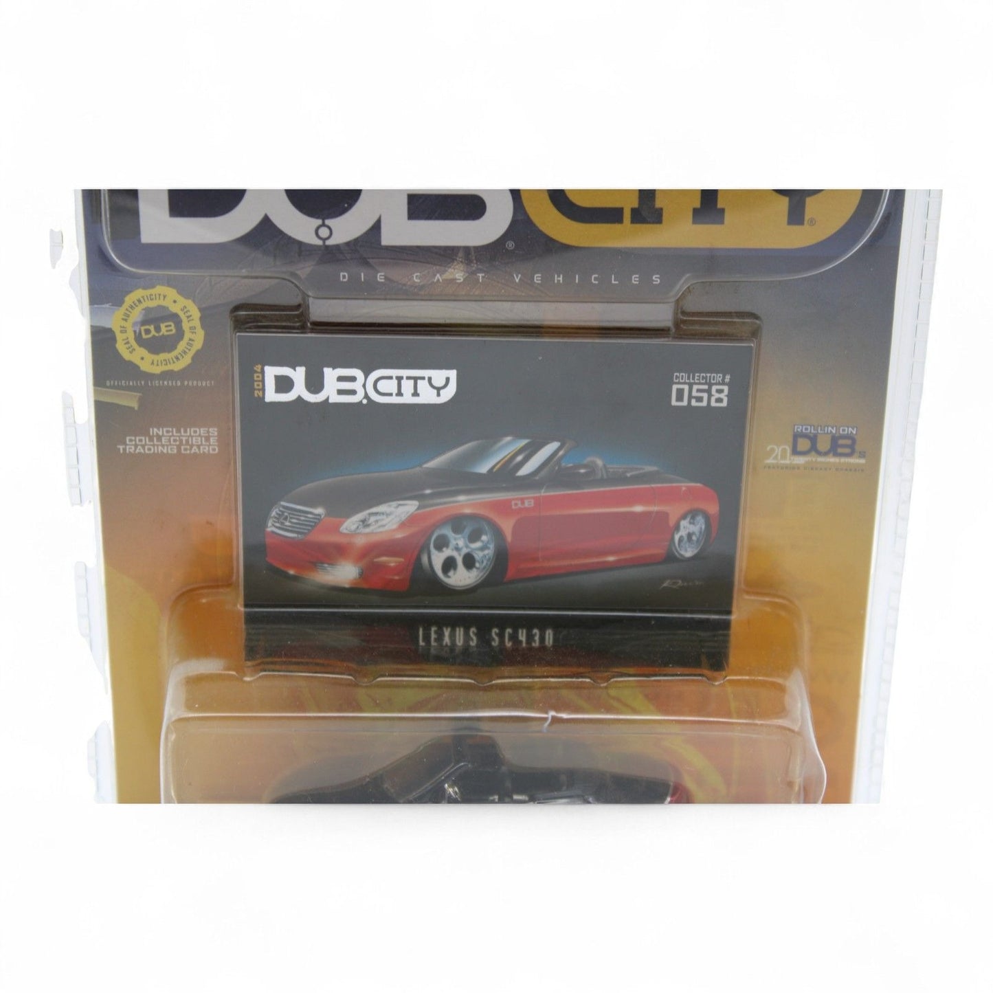 Jada Toys Dub City Lexus SC430 die-cast car in 1:64 scale features a sleek red and black finish, includes collectible trading card, new in package.