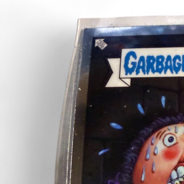 Garbage Pail Kids Trading Card #8 Gnawing Nora Featuring Elliot Mess