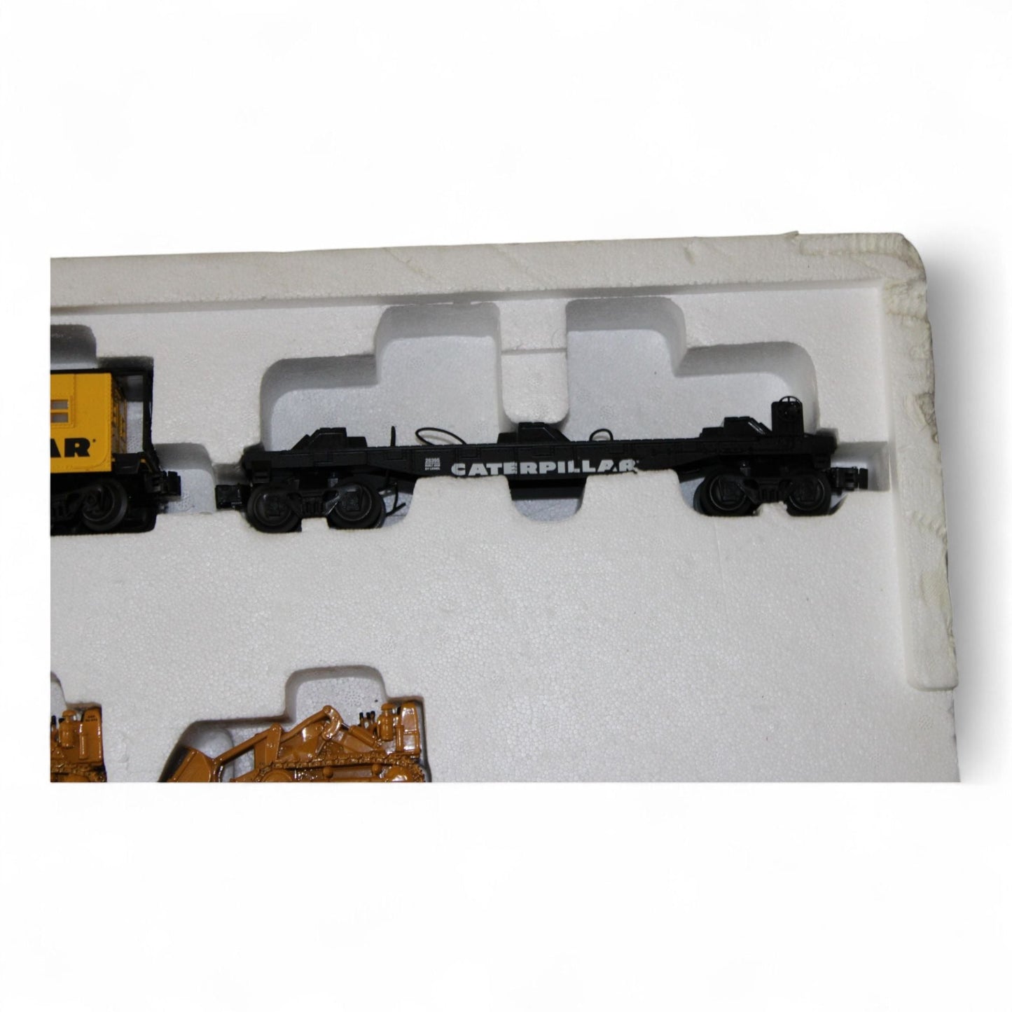 Lionel Caterpillar steam engine train set with tracks and accessories