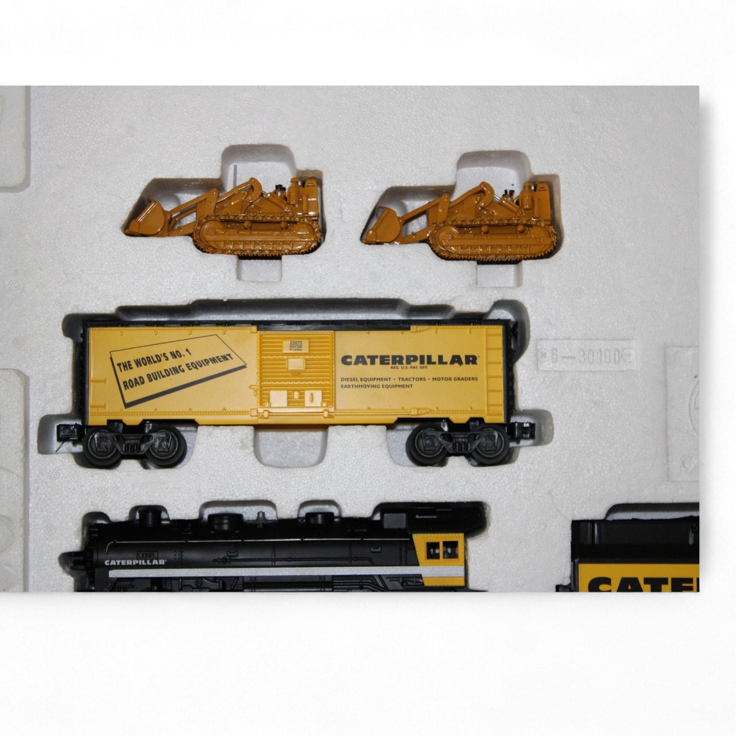 Lionel Caterpillar steam engine train set with tracks and accessories