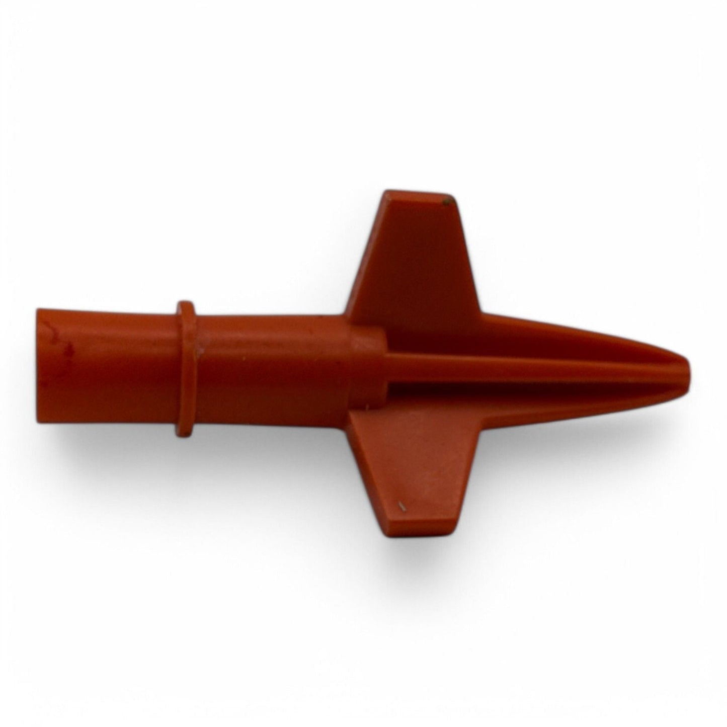 Vintage orange rocket accessory from 1967