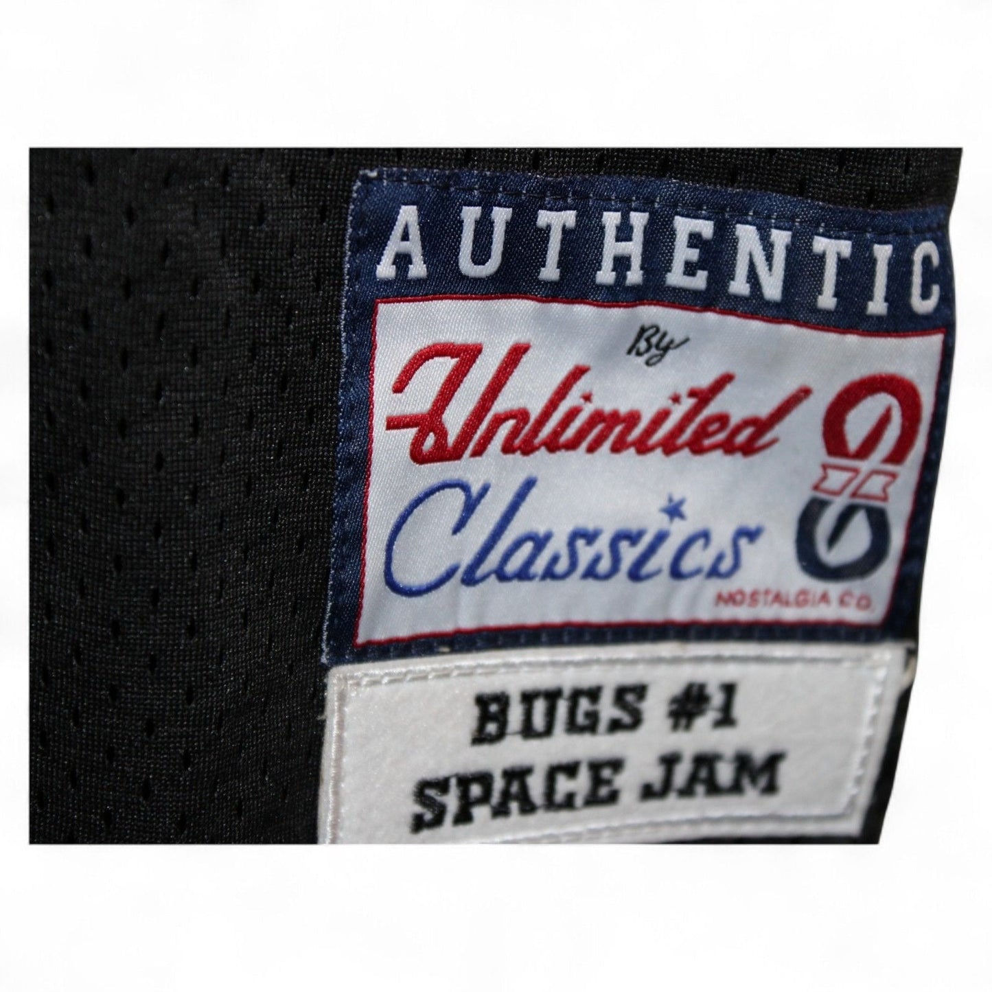 Close-up of Unlimited Classics Nostalgia Co label on Space Jam Bugs #1 Tune Squad Black Basketball Jersey