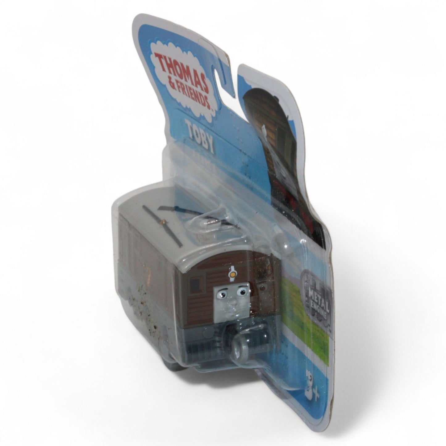 Thomas & Friends Toby metal engine by Fisher-Price is a detailed die-cast train for ages 3+, featuring classic brown and gray colors in new packaging.
