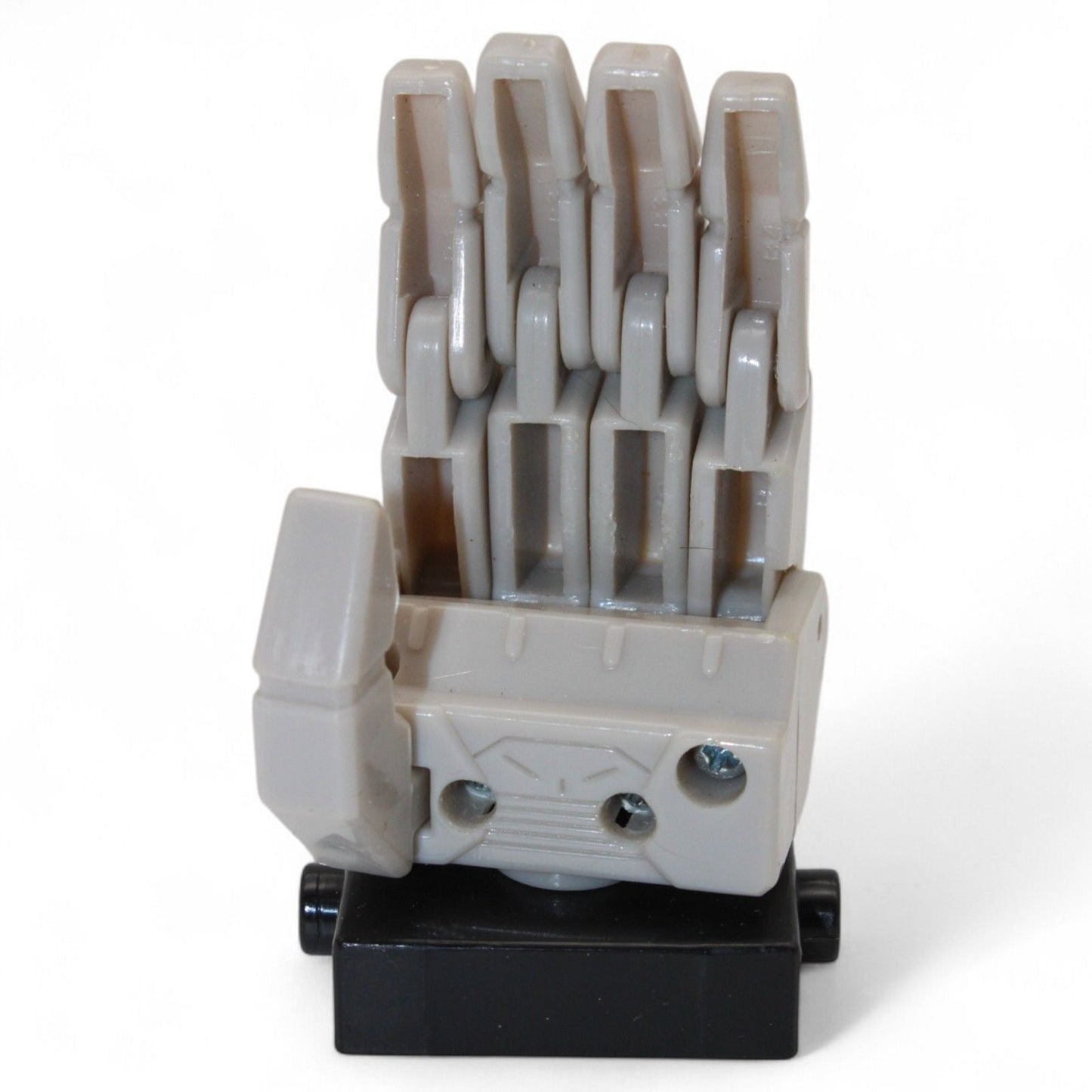 Back view of Transformers Armada Unicron left hand replacement part in gray and black