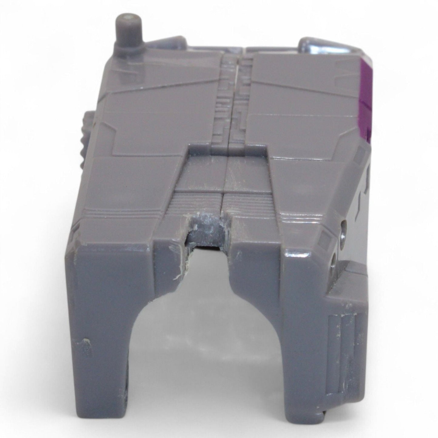 Close-up of gray and purple Transformers Armada Unicron leg part