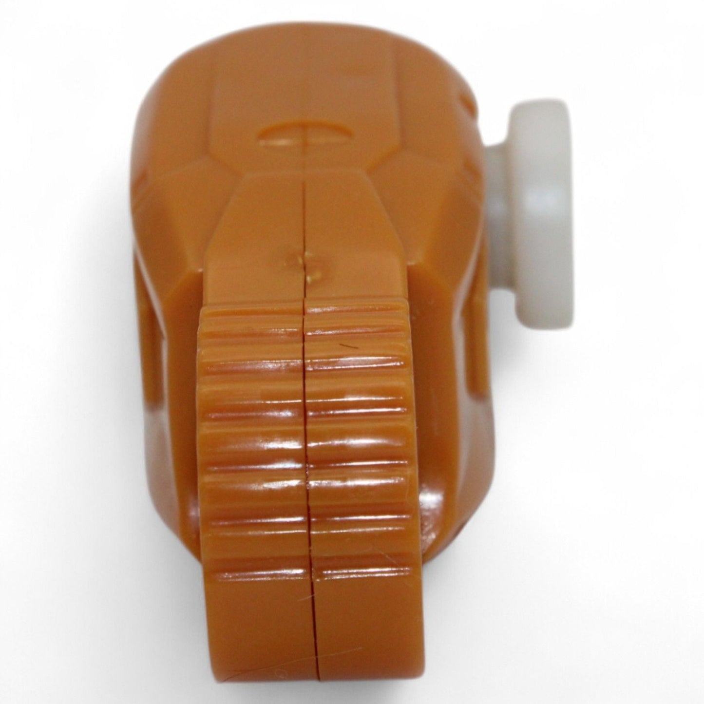 Detailed view of orange plastic leg part for Unicron action figure