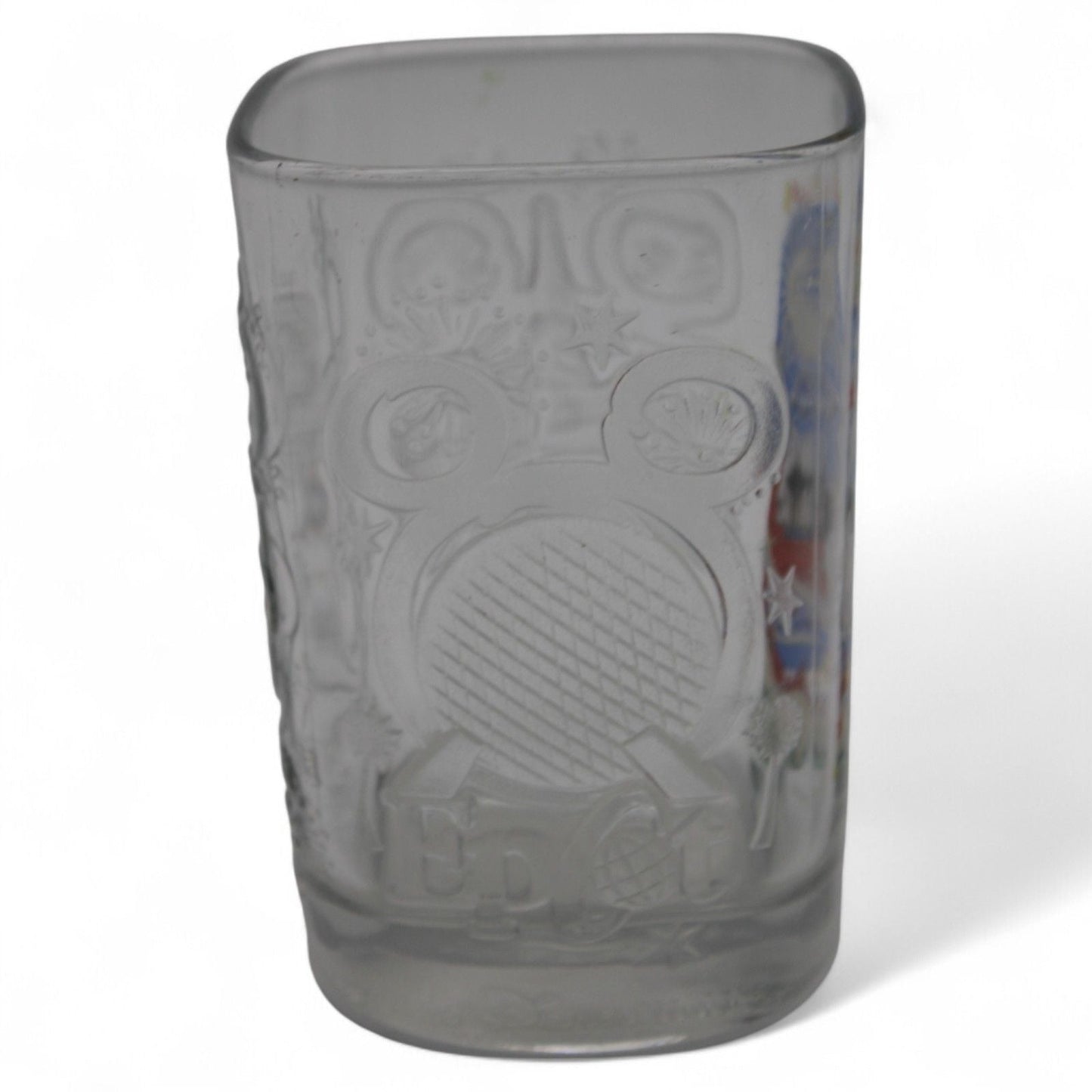 Embossed Disney landmarks on vintage 2000 collector glass