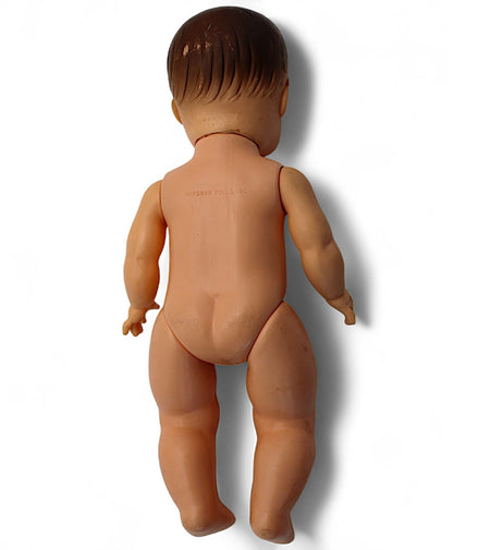 Back view of vintage Horsman doll showing jointed limbs