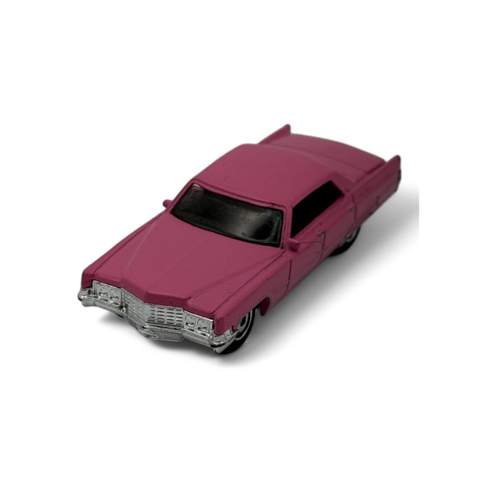 Side view of pink 1969 Cadillac Sedan DeVille diecast