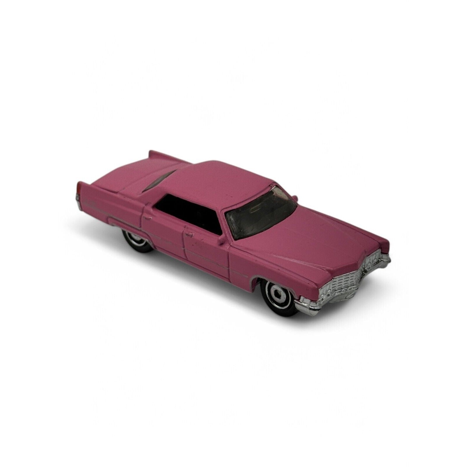 Front view of 1969 Cadillac Sedan DeVille pink model
