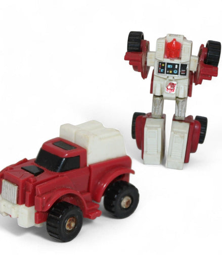 1984 Takara Transformers Swerve Mini Bot in robot and car form