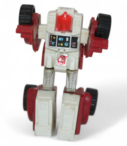 Close-up of 1984 Takara Transformers Swerve Mini Bot robot