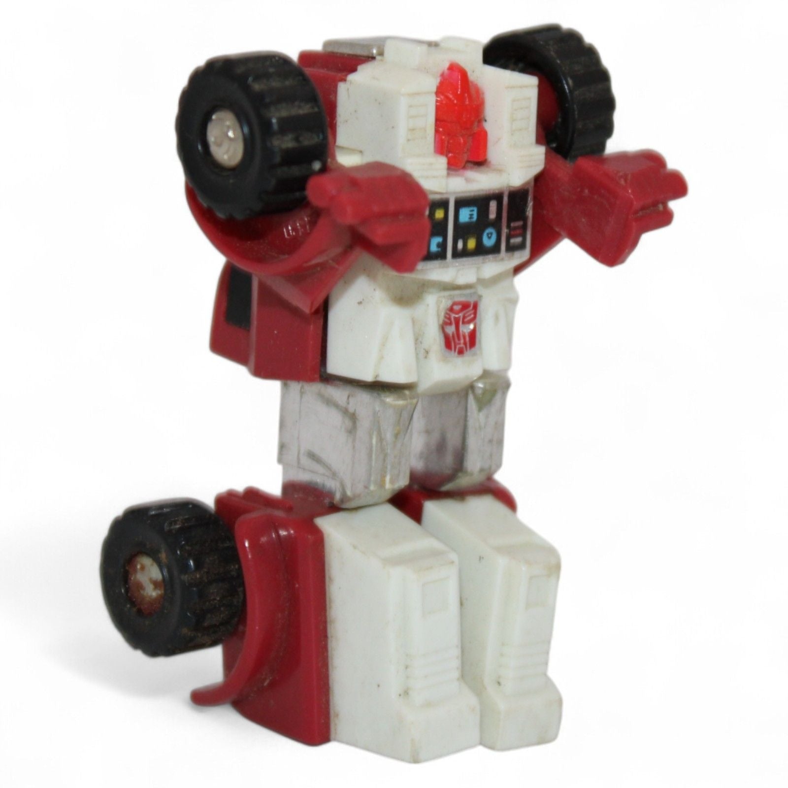 Back view of 1984 Takara Transformers Swerve Mini Bot robot