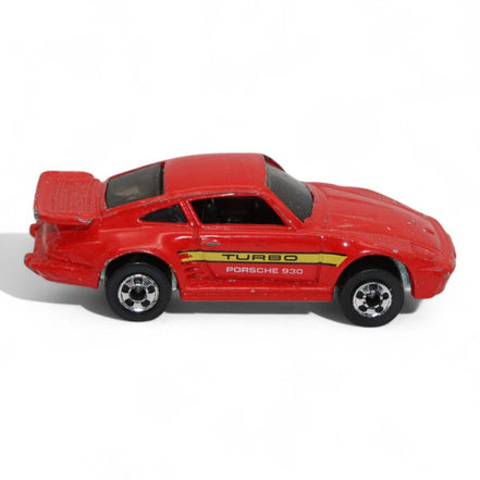 Side profile of 1989 Hot Wheels Porsche 930 Turbo red diecast