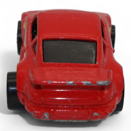 1989 Hot Wheels Porsche 930 Turbo red model car rear angle