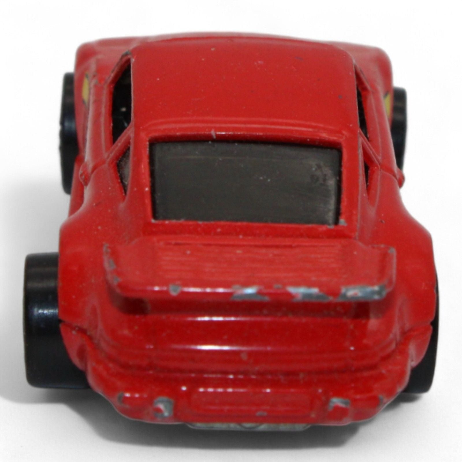 1989 Hot Wheels Porsche 930 Turbo red model car rear angle