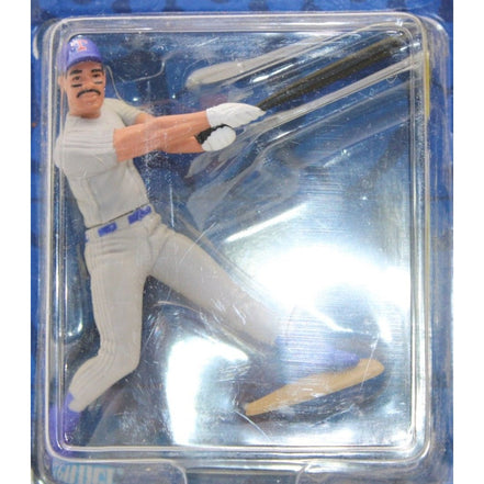 Close-up of Juan Gonzalez action figure in baseball uniform