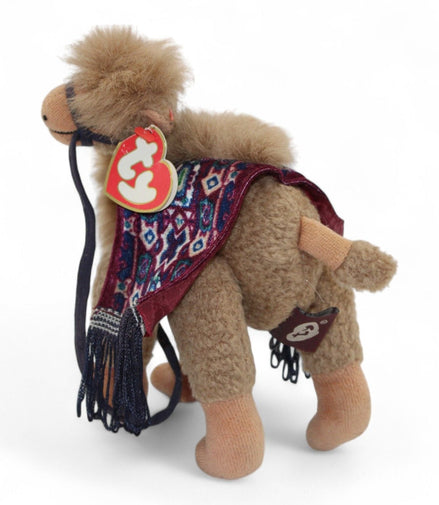 Side view of TY Lawrence Camel plush with intricate saddle