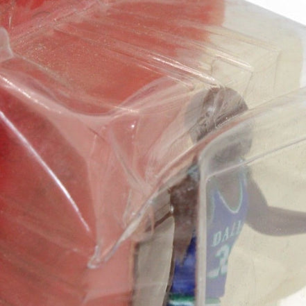 Close-up of Jamal Mashburn figure in Dallas Mavericks jersey