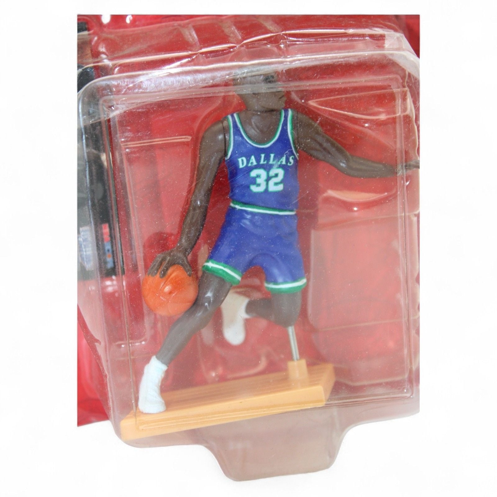 Jamal Mashburn NBA figure with basketball in hand