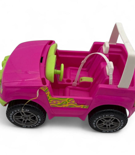 Top view of Barbie Jeep Wrangler Convertible showcasing interior and steering wheel