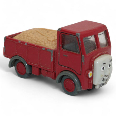 Side view of 2002 Thomas Train die-cast red lorry truck