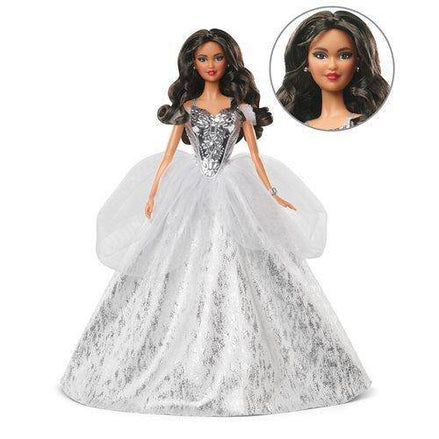 Close-up of 2021 Holiday Barbie Doll with brunette hair and silver gown