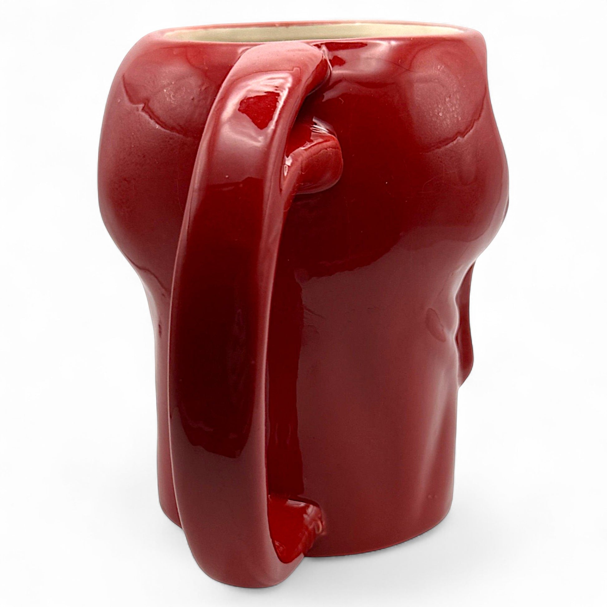 Back view of Carnage Marvel mug highlighting molded head and ergonomic handle design
