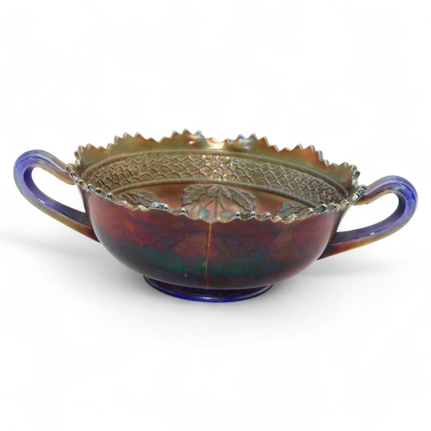 A vintage Fenton Carnival Glass cherry circles bonbon bowl with two handles, scalloped edge, and beautiful iridescent finish, excellent display piece.
