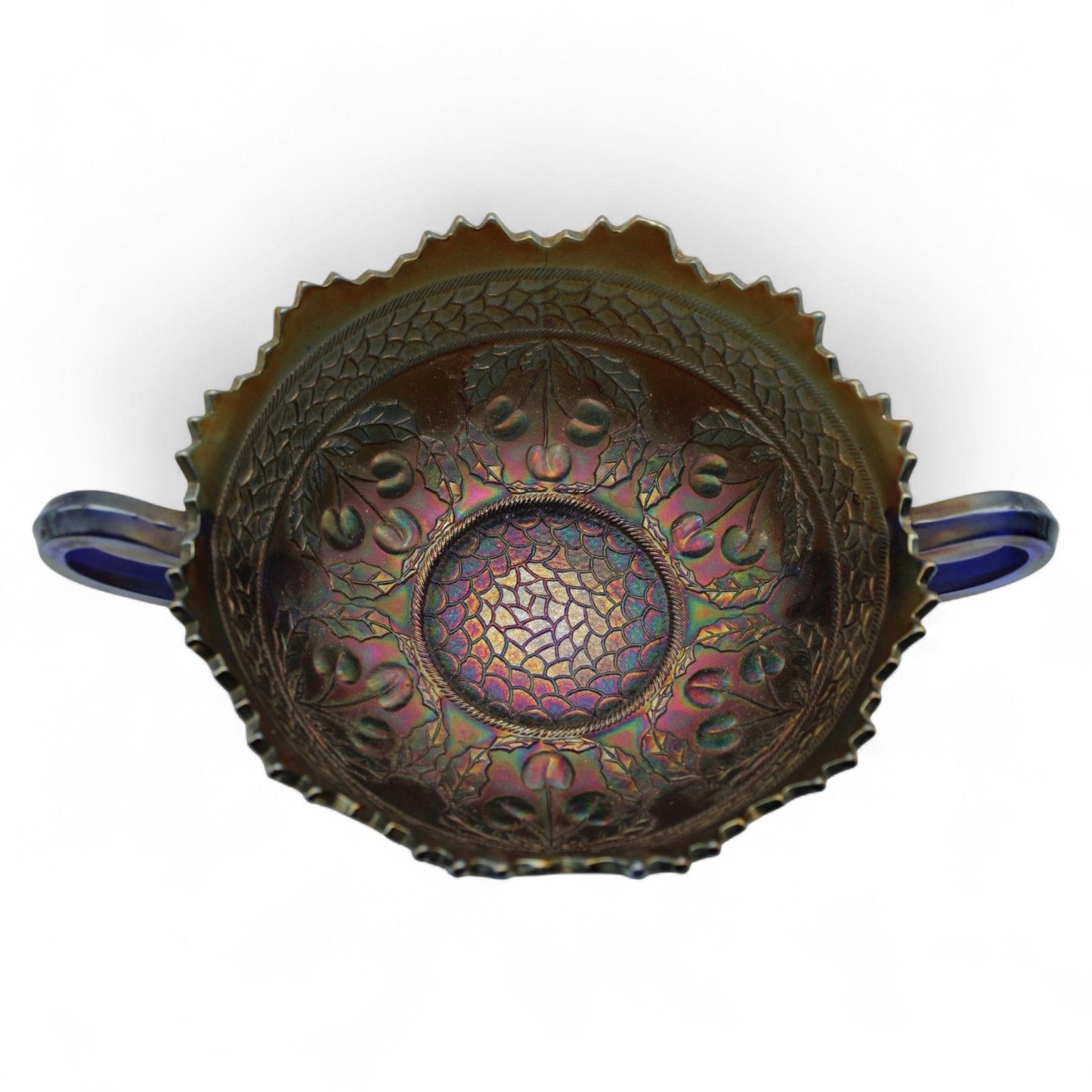 A vintage Fenton Carnival Glass cherry circles bonbon bowl with two handles, scalloped edge, and beautiful iridescent finish, excellent display piece.
