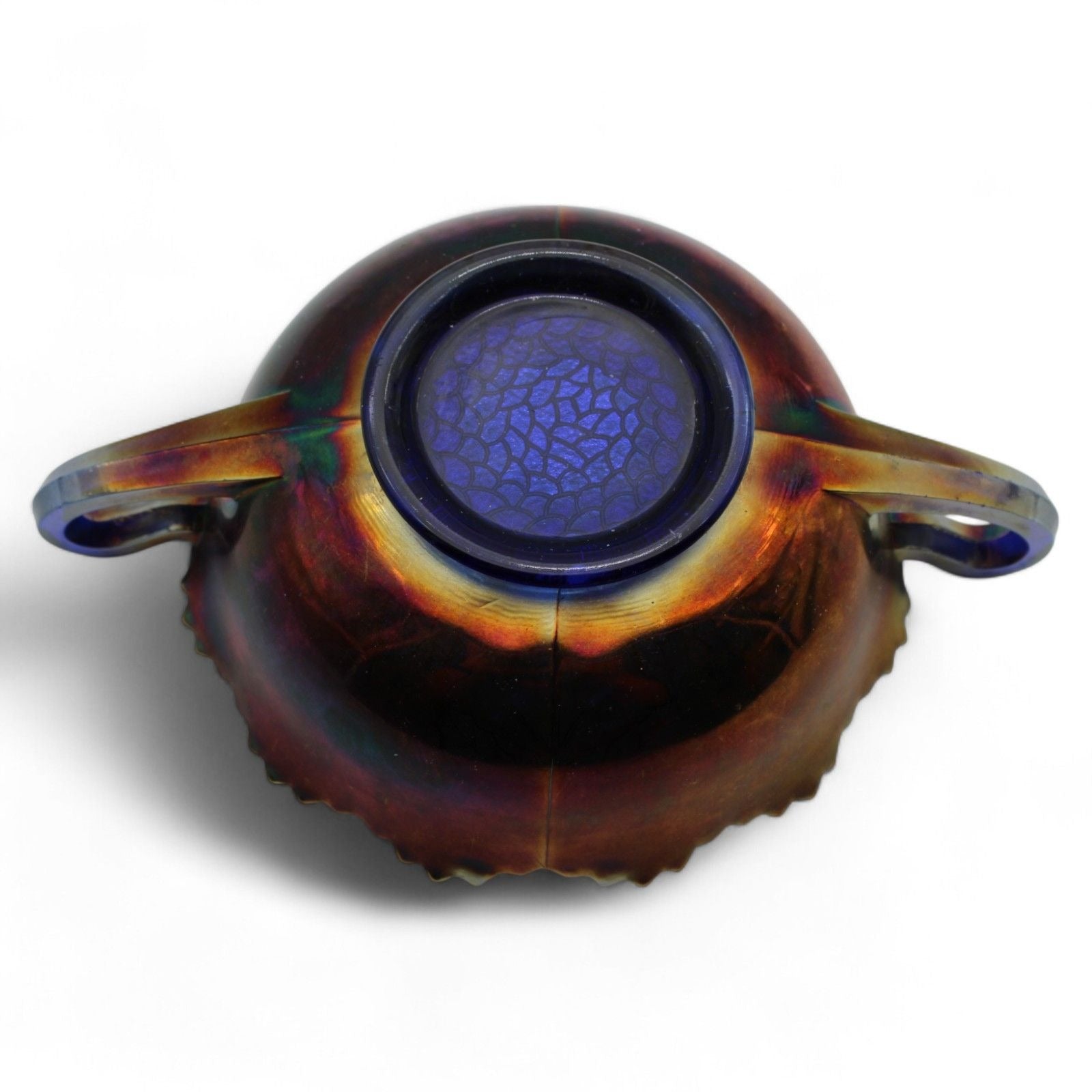A vintage Fenton Carnival Glass cherry circles bonbon bowl with two handles, scalloped edge, and beautiful iridescent finish, excellent display piece.
