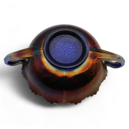 A vintage Fenton Carnival Glass cherry circles bonbon bowl with two handles, scalloped edge, and beautiful iridescent finish, excellent display piece.
