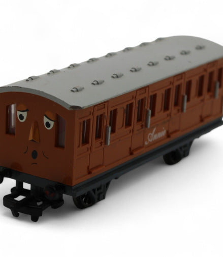 Annie passenger coach toy model in brown and gray plastic
