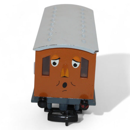 Front view of Annie coach toy model with detailed face