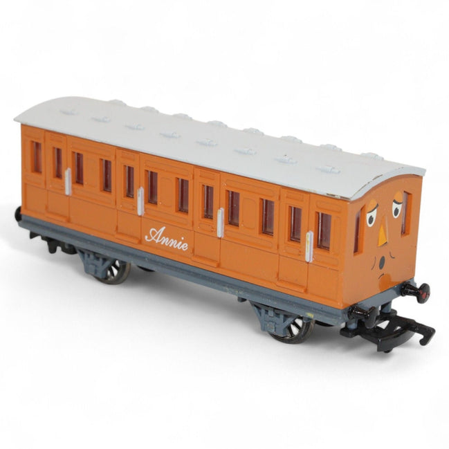 Side view of Annie coach compatible with wooden tracks
