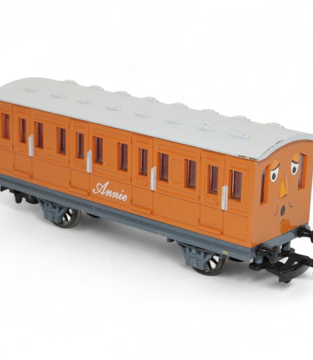 Side view of Annie coach compatible with wooden tracks