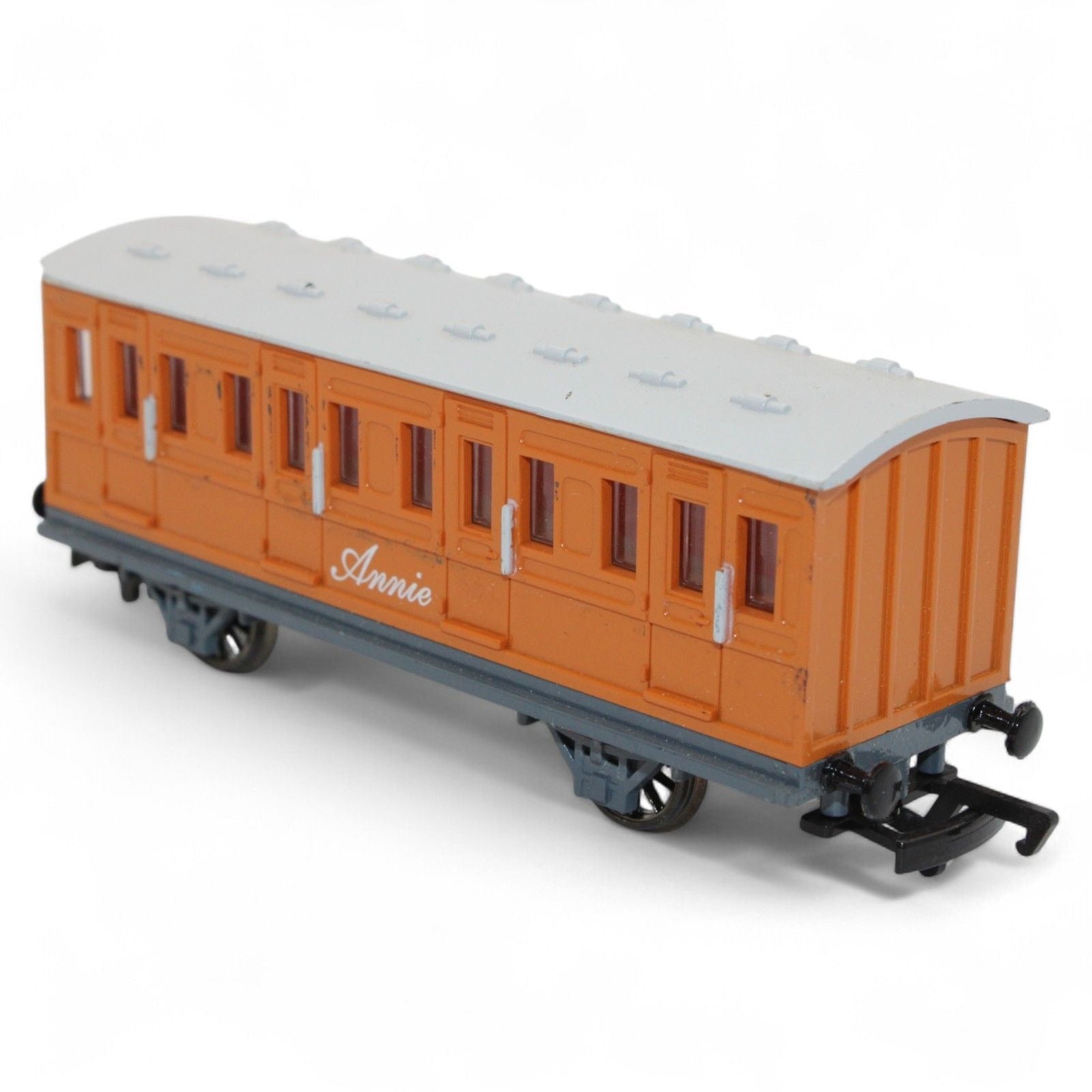 Annie passenger coach toy model in brown and gray plastic