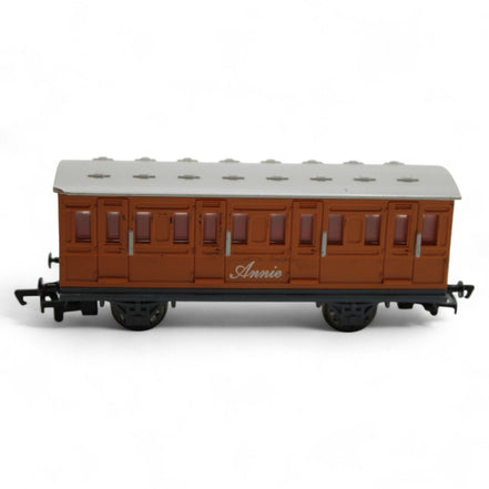 Annie passenger coach toy model in brown and gray plastic
