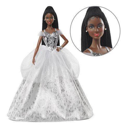 Close-up of Barbie 2021 Holiday Doll with dark hair and silver gown