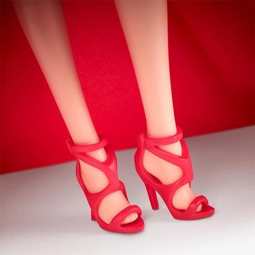 Close-up of Barbie doll's red high heels