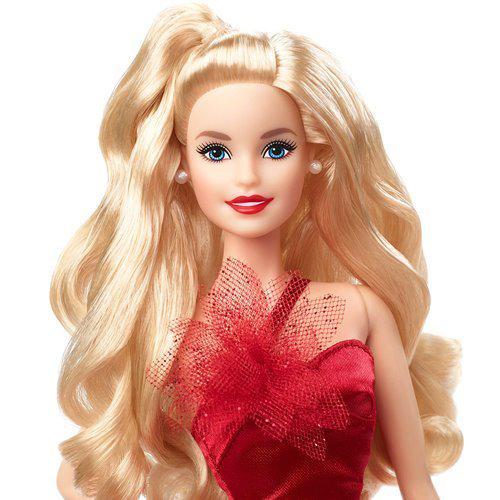 Barbie doll in red gown with long blonde hair